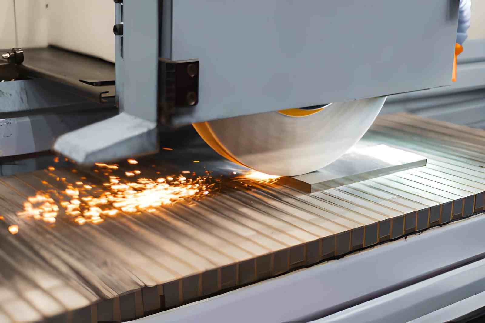 Surface grinding a flat metal part