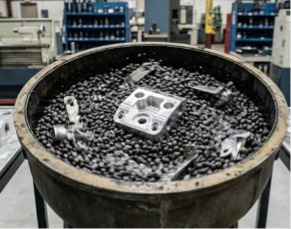 CNC machined parts in  the vibratory tumbling process