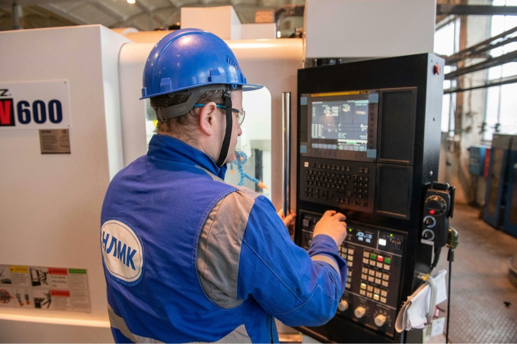 Operator using a CNC machine